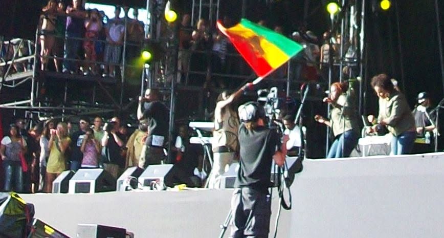 Nas and Damian Marley trackside, frame 3